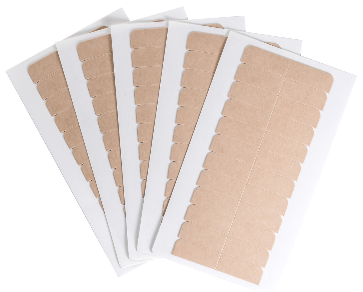 Five sheets of Big Kizzy Original Brown Double Sided Hair Extension Tape Tabs Fanned Out